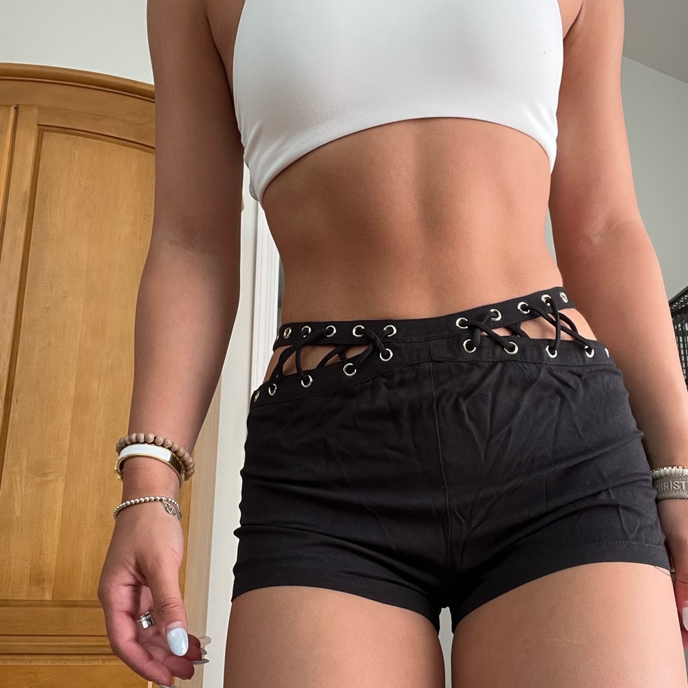 Brand- Millau. black shorts with lace up detail and silver rings